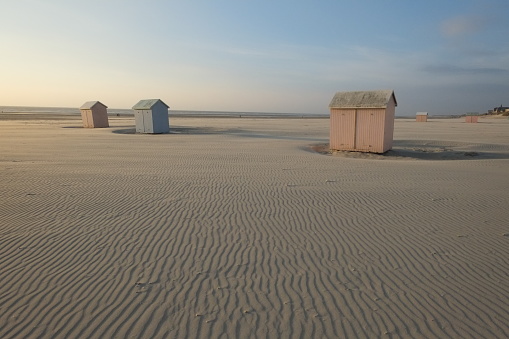 Berck, France - April the 13th, 2017: Some wooden beach cabin on the beach of Berck in the north of France
