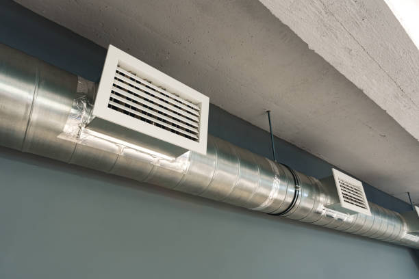 istock Silver ventilation pipes hanging from the ceiling inside the building 1457911976
