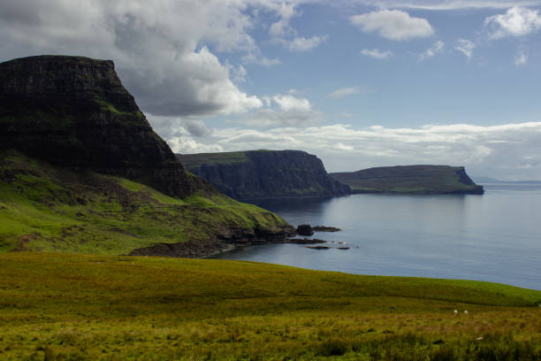 istock Ocean coast at Neist point lighthouse, Scotland 1457918776