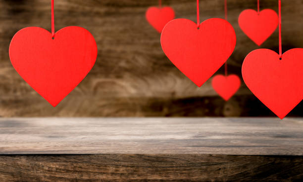 istock Red hearts on wooden background. 1457920463