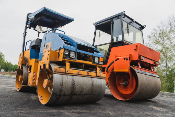 Orange road-roller on repairing of the road
