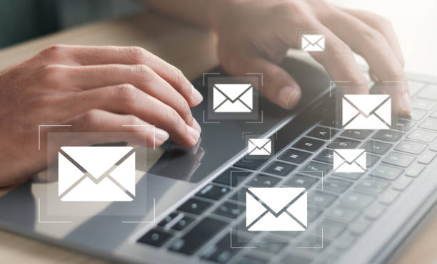 istock Marketing concept. Man using laptop pc with email icon. Direct selling project in customer list business for email. 1457922052