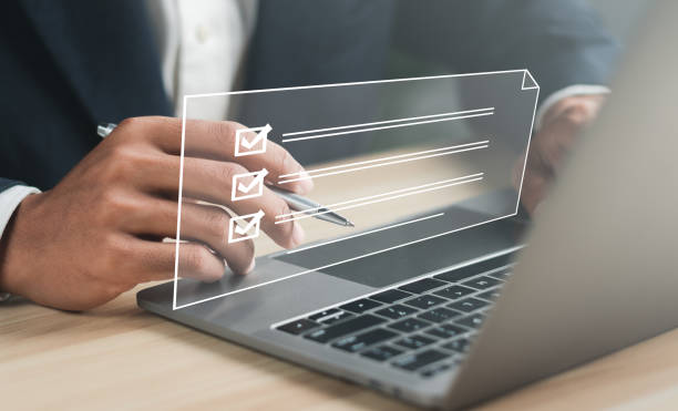 istock E-signing concept. Businessman signing electronic documents on digital documents online. digital document management paperless office Signing a business contract. 1457922227