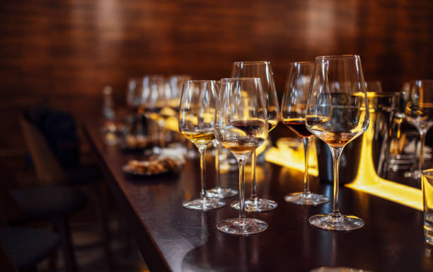 istock Glass goblets placed in rows on table during wine tasting procedure in restaurant 1457923285