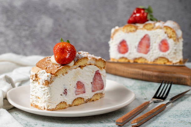 Strawberry and whipped cream cake. Strawberry and cream layer cake on plate. close up stock photo