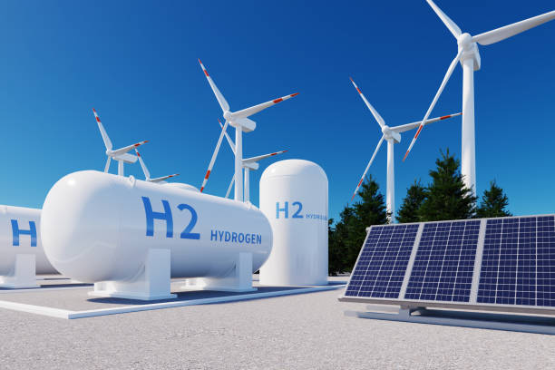istock h2 hydrogen tank, solar panels and wind power turbines, 3d rendering 1457929847