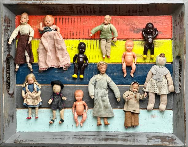 Vintage puppets collection lying on a colorful tray