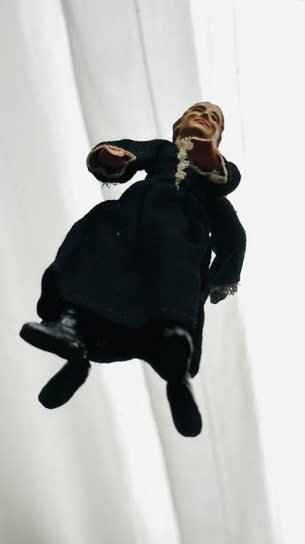 Vintage puppet, grandmother lying on back