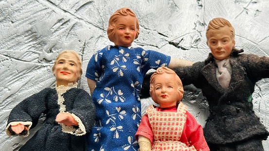 Vintage puppets family, four dolls