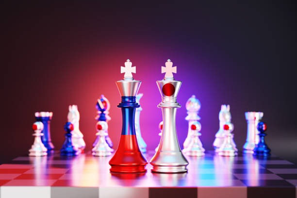 istock Russian and Japanese Flag chess king on a chessboard 1457930426