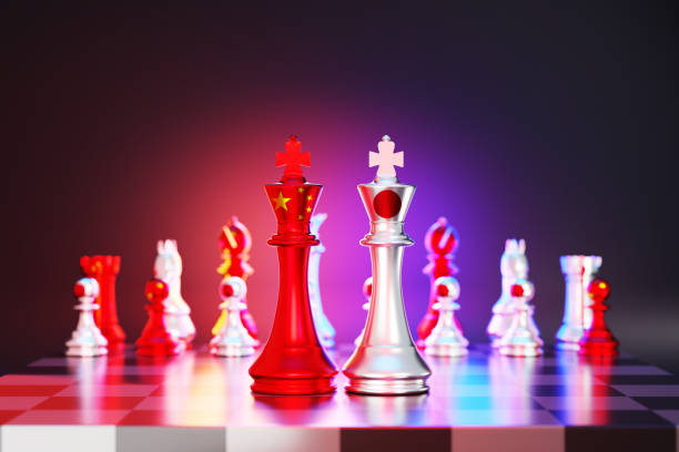 istock Japanese and Chinese flag chess king on a chessboard 1457931581
