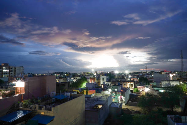top view of city from terrace , raipur, chhattisgarh ,india, A beautiful evening view in beautiful climate or weather, time after sunsets in eve, relaxing clouds in blue, white and orange, lights on vista superior de la ciudad desde la terraza, raipur, chhattisgarh, india, una hermosa vista nocturna en un clima o clima hermoso, tiempo después de las puestas de sol en la víspera, nubes relajantes en azul, blanco y naranja, luces encendidas
