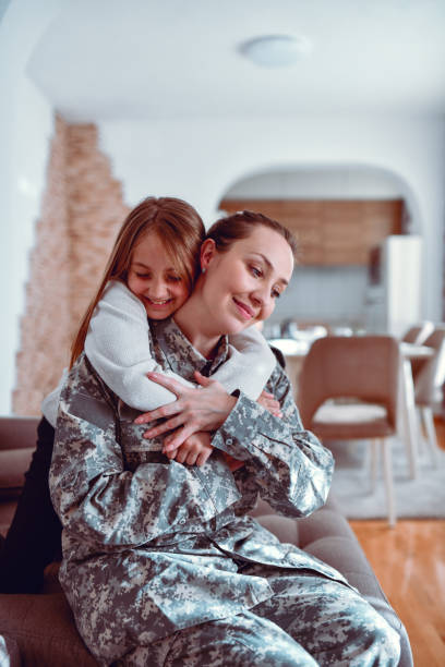istock Love Between Female Soldier And Her Daughter 1457934671