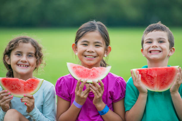 istock Children Eating Watermelon 1457934942