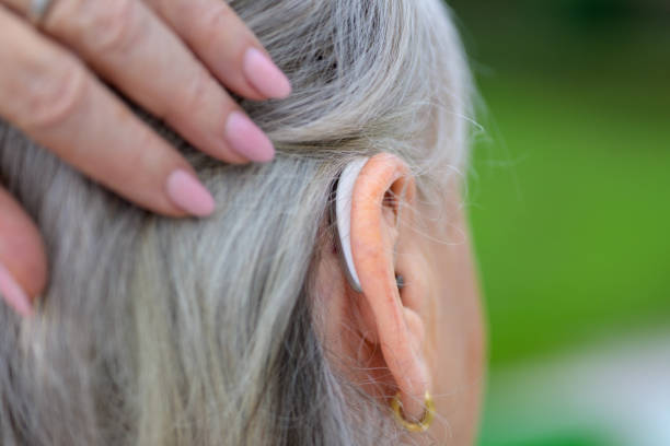 istock Hard of hearing lady in her 80's 1457937286