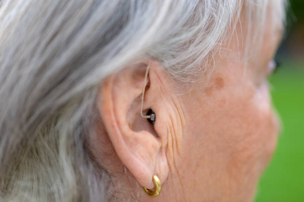 istock Lady in her eighties with a hearing aid 1457937473