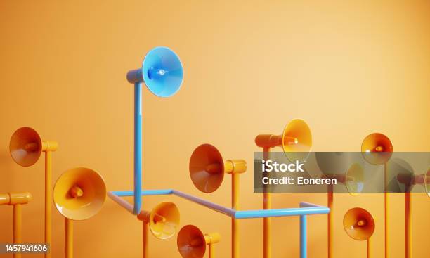 Blue Colored Megaphone Standing Out From The Crowd Stock Photo - Download Image Now - Marketing, Megaphone, Communication