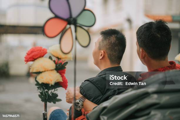 Asian Chinese Father And Down Syndrome Son Enjoying Rickshaw Ride In Penang Old Town Stock Photo - Download Image Now