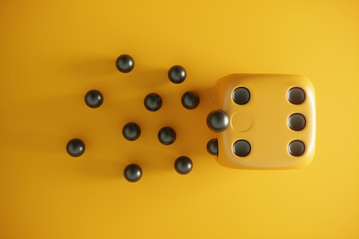 Black spheres escaping from the dice to the freedom. (3d render)