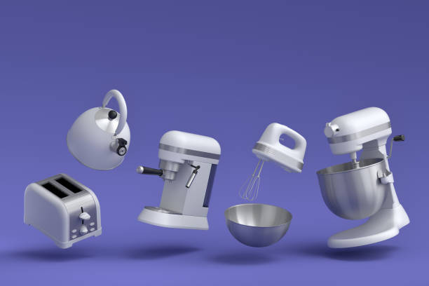 istock Espresso coffee machine, hand mixer, kettle and toaster on violet background. 1457950905