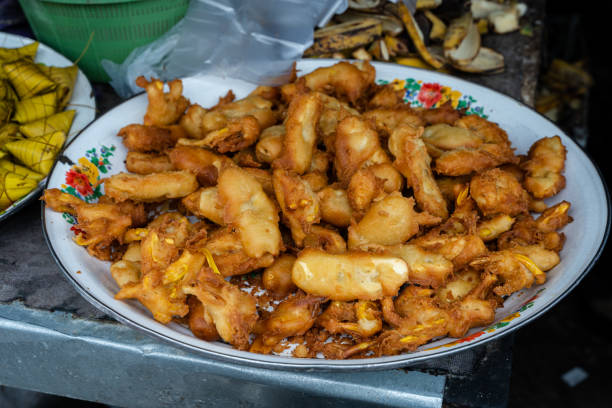 istock Fresh fried banana and jackfruit on a while bowl, snack in Indonesia Bali 1457950962
