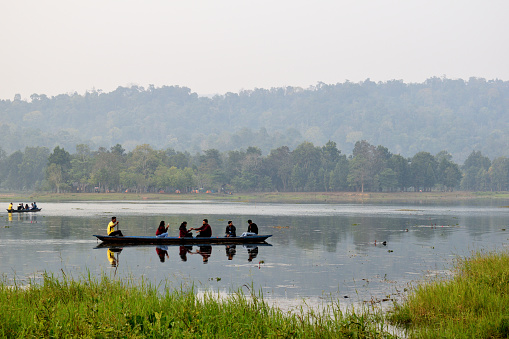 People boating in a lake at Chandubi lake located at Rabha Hasong Autonomous Council, Kamrup District