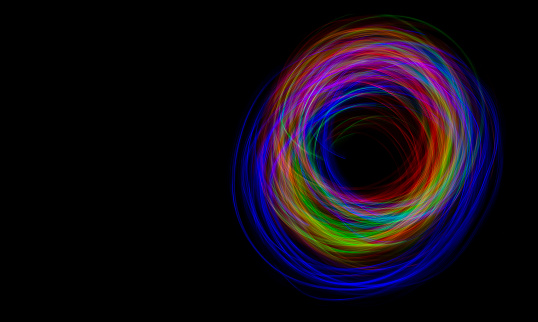 Black hole concept with ring of colorful lights around in astronomy concept.