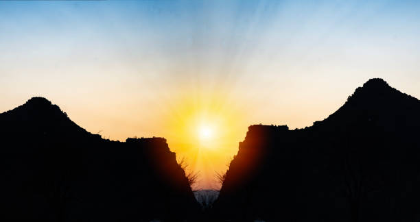istock Two mountains with sunset in the background. Copy space for your design 1457952086