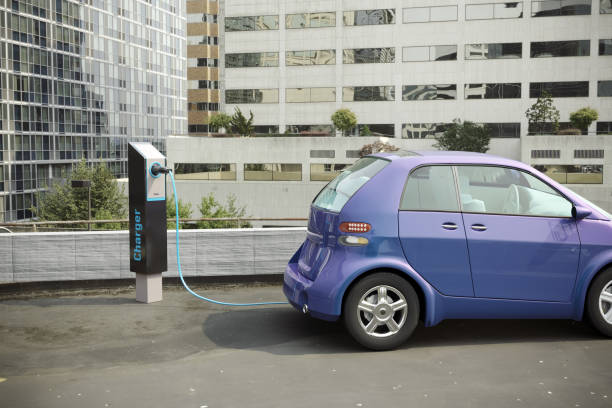 Electric car charging stock photo