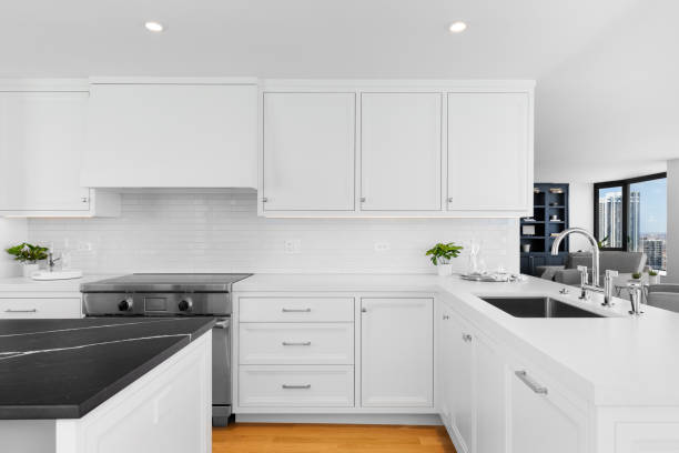 istock A white kitchen with  white and black marble countertops. 1457954708