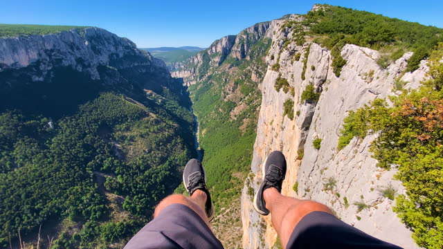 The exhilarating feeling of sitting on a cliff above Gorges du Verdon canyon