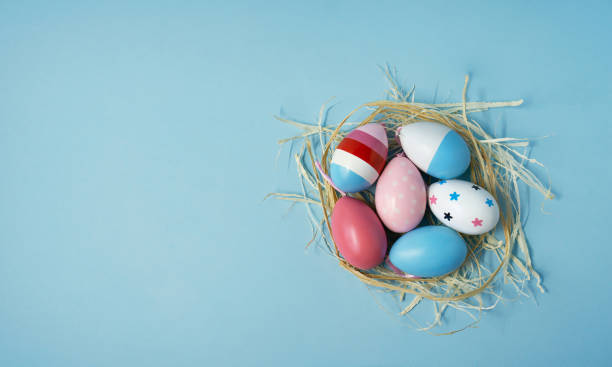 istock Boiled chicken eggs with hand drawn ornament ready for Easter hunt. 1457957945