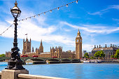 London Big Ben tower, Westminster bridge over Thames river England UK