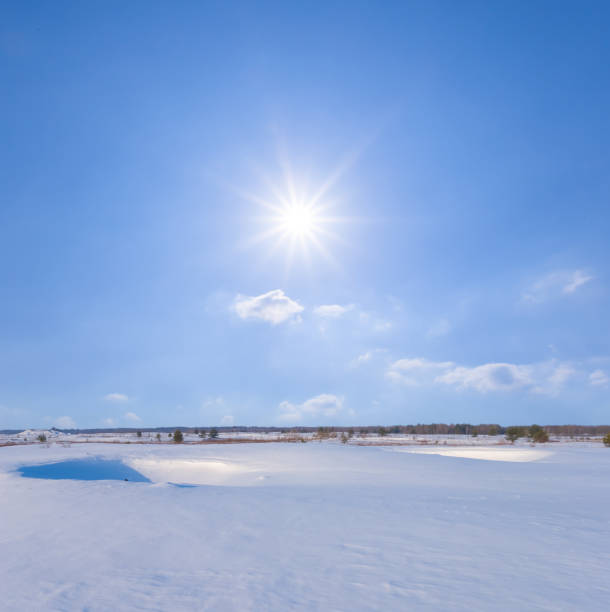 istock winter snowbound plain at sunny winter day 1457968073