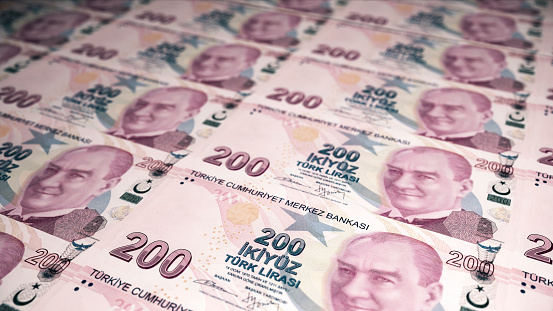 3d render 200 Turkish Lira Front coming out of the printing press (depth Of Field)