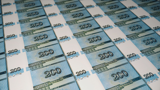 3d render 200 Won North Korea Money Back coming out of the printing press (depth Of Field)