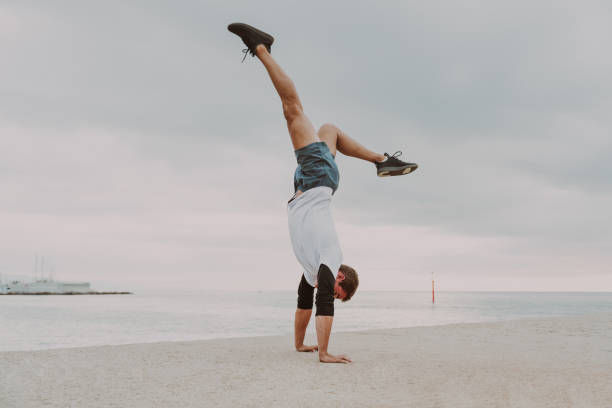 istock Athletic man doing functional training exercise at the outdoor gym 1457975698