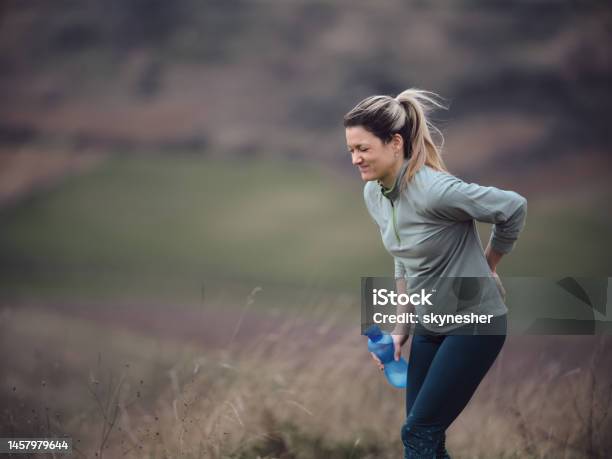 Ugh My Back Hurt A Lot Stock Photo - Download Image Now - Pain, Sportsperson, Adult