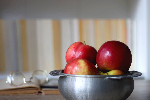 istock Book, Tablet, Eyeglasses and Apples 1457991325
