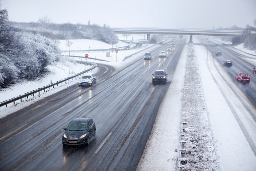 Heavy snowfall on German highway - unrecognisable cars