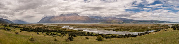 panoramic view of tasman river in new zealand - flowing nature new zealand uncultivated imagens e fotografias de stock