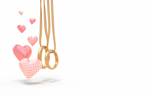 3d Render Gold Wedding Rings attached to chain & Heart Ornaments, For Engagement, Wedding, Love and Valentine's Day Concepts (İsolated on white & Clipping path)