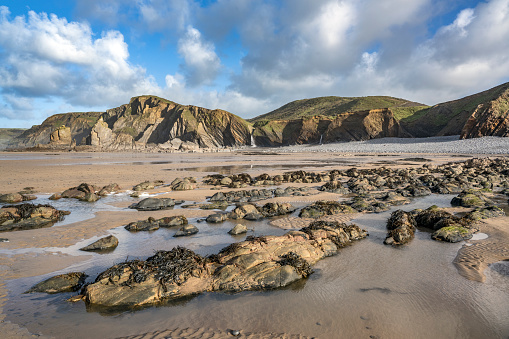 Sandy mouth Bay beach and rock formations  in Cornwall