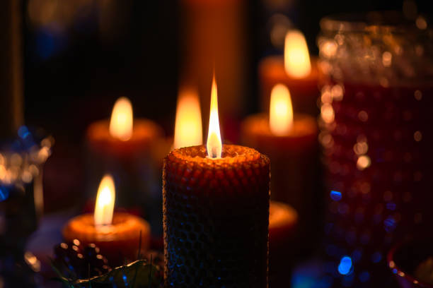 istock Burning wax candles on the festive Christmas table 1458001259