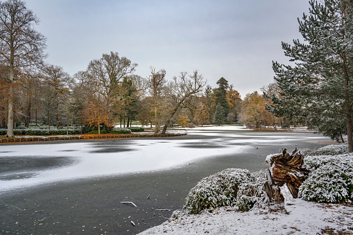 Scattering of snow at Claremont Gardens in Esher Surrey UK