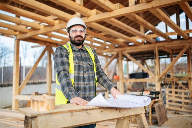 istock Portrait of a smiling architect at construction site. 1458002671