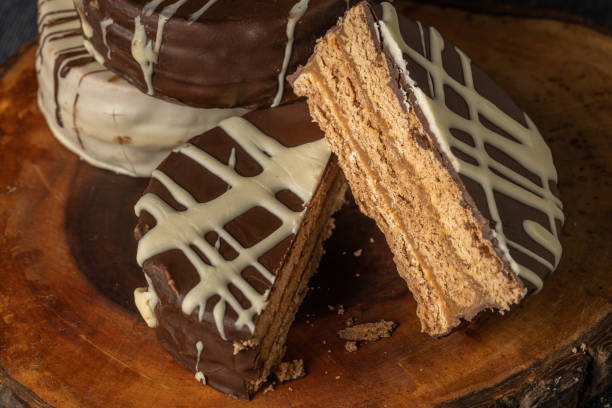 istock Alfajor cut in half, typical candy from Argentina, on a wooden board. 1458010741