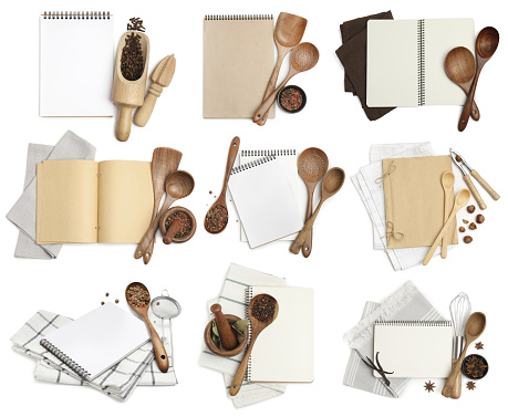 Set with blank recipe books and kitchen utensils on white background, top view