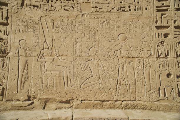 istock Hieroglyphics and painting on the ancient structures in Egypt 1458015130