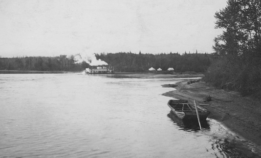 The SS Athabasca paddle steamer ship on the Athabasca River in Alberta, Canada. Vintage photograph ca. 1913.